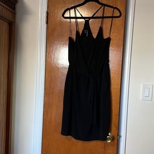 Cute black dress in size XL with adjustable straps.
